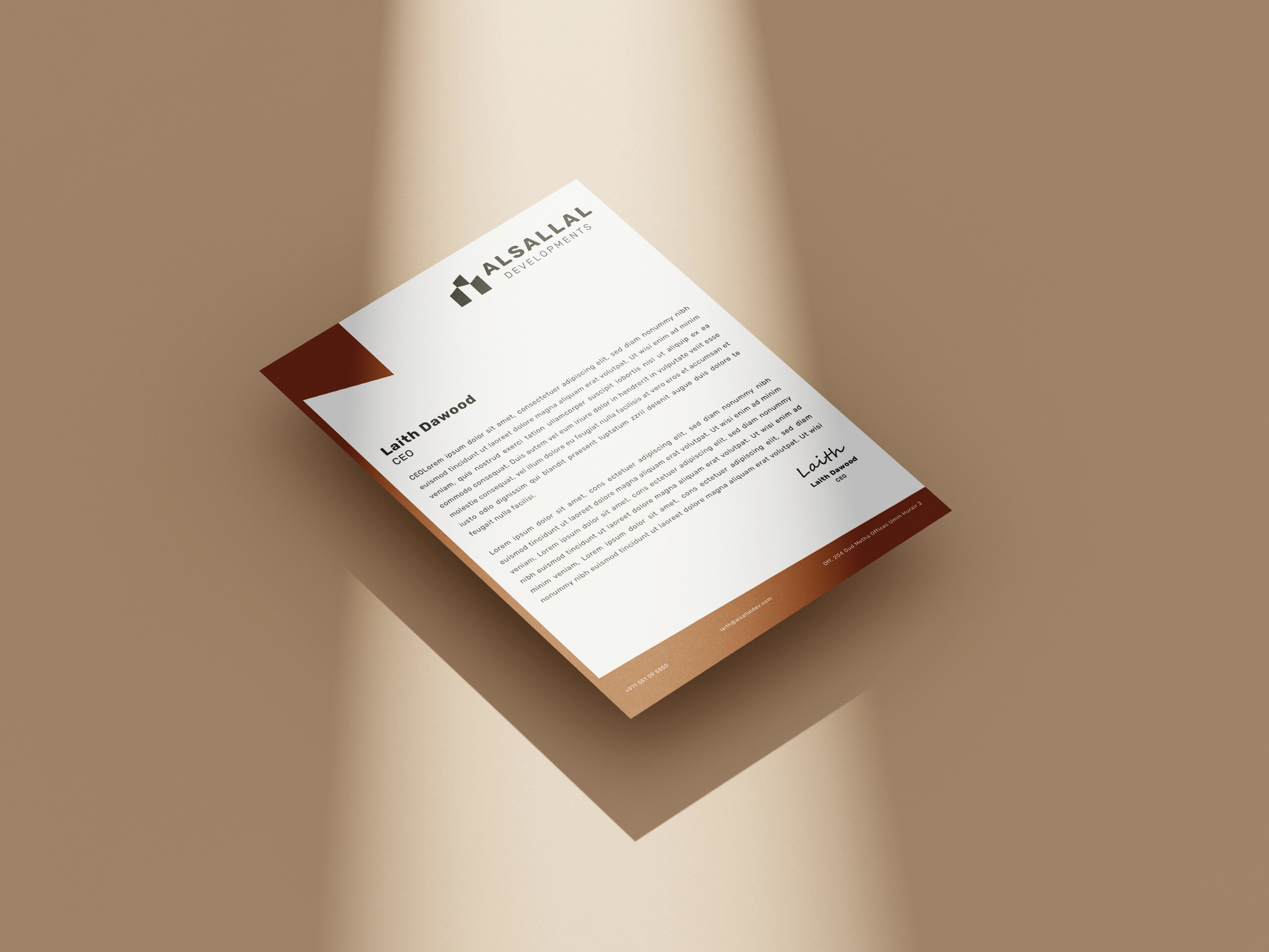 Alsallal Developments letterhead with warm bronze framing and formal corporate typography.