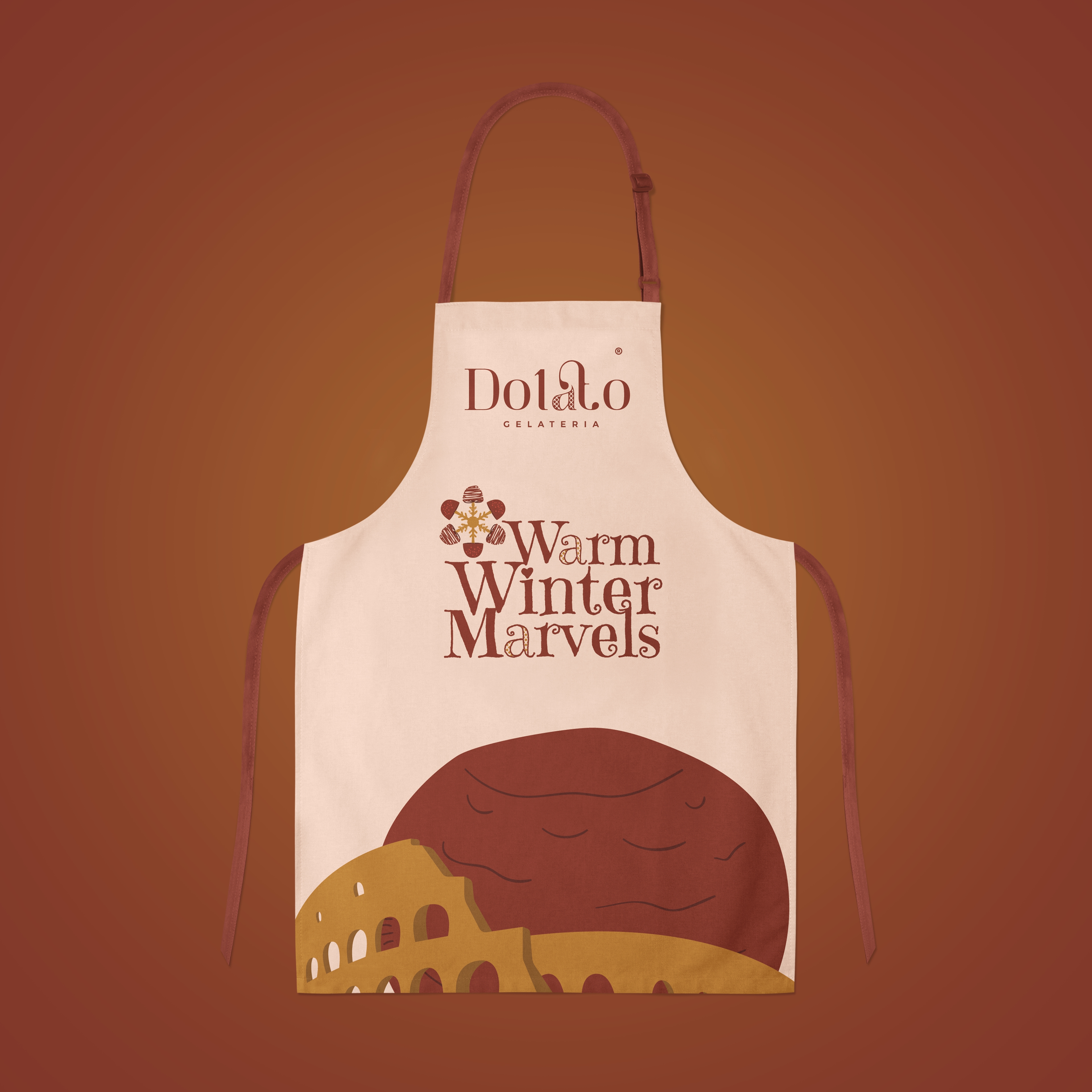 Cream Dolato Gelateria apron mockup featuring Warm Winter Marvels lettering and an Italian-inspired snow character illustration.