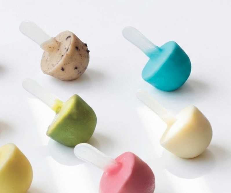 Colorful miniature gelato pieces used as a playful Dolato product-form reference.