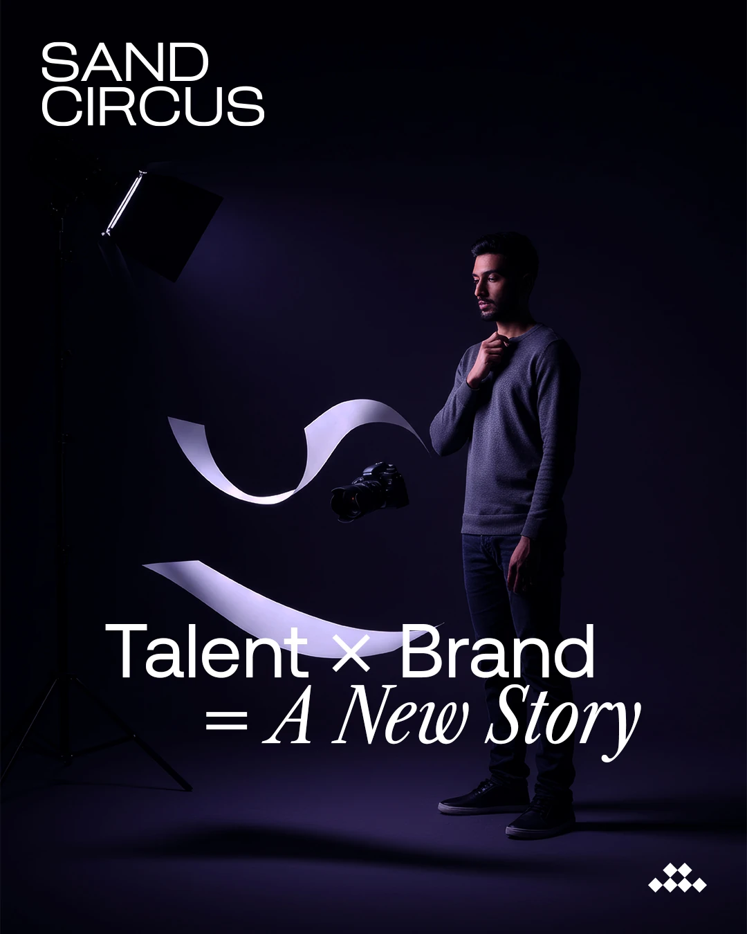 English Sand Circus Talent x Brand design showing a man beside a flowing ribbon on a deep purple background.